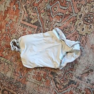 One piece white swimsuit.